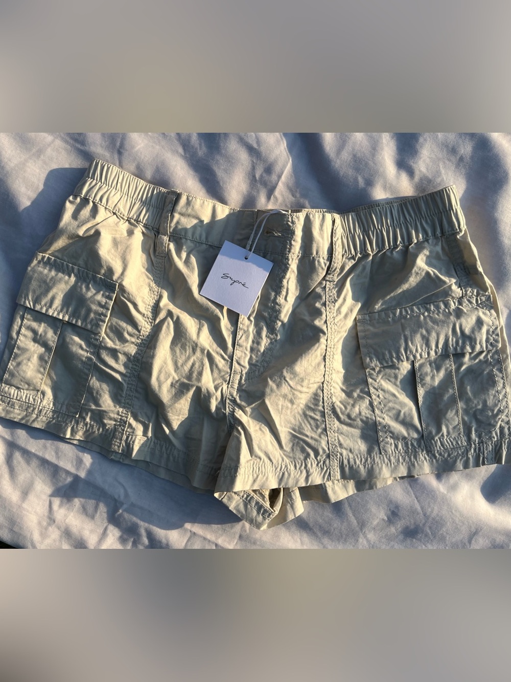 Cream color cargo shorts